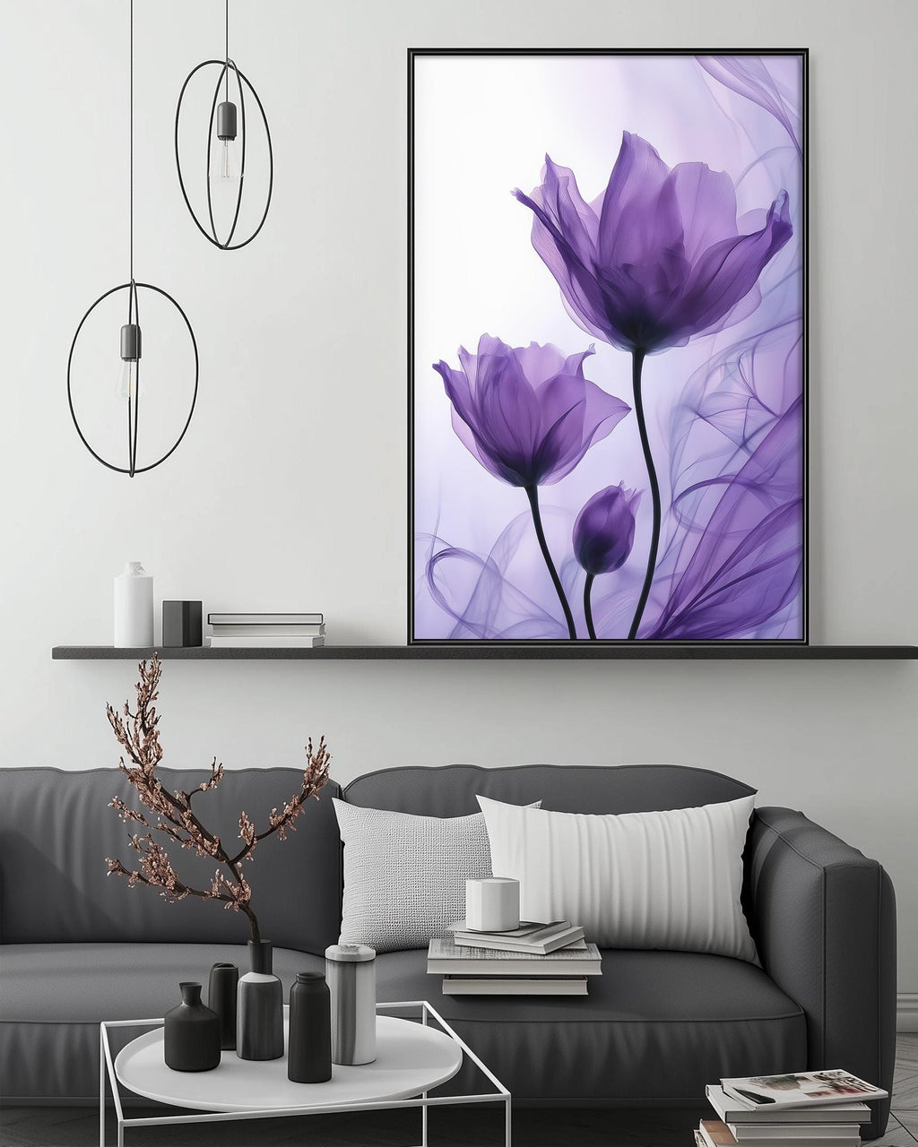 a modern living room with a gray sofa, a coffee table, and a large framed picture of purple flowers hanging on the wall above the sofa.
