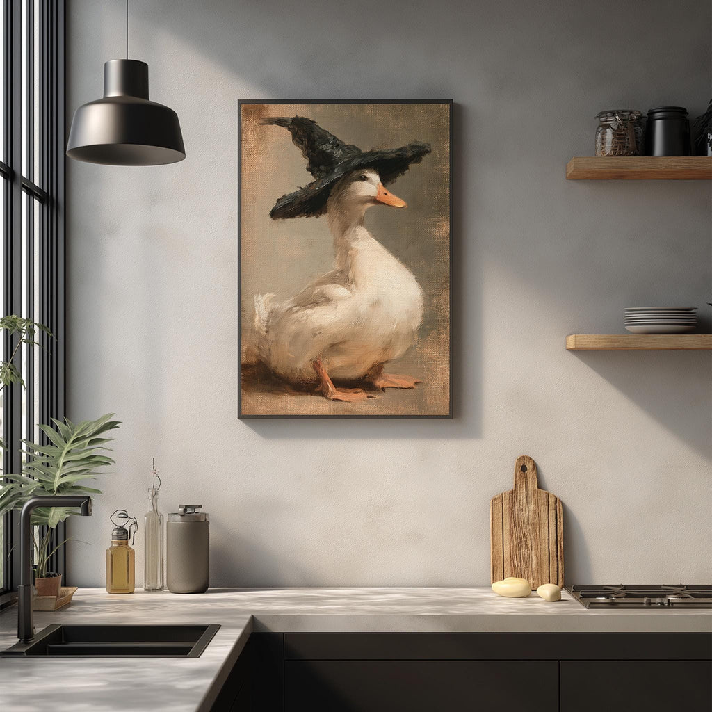 a kitchen scene with a framed painting of a duck wearing a black hat, a wooden cutting board, and various kitchen items such as a sink, a bottle, and a bowl.