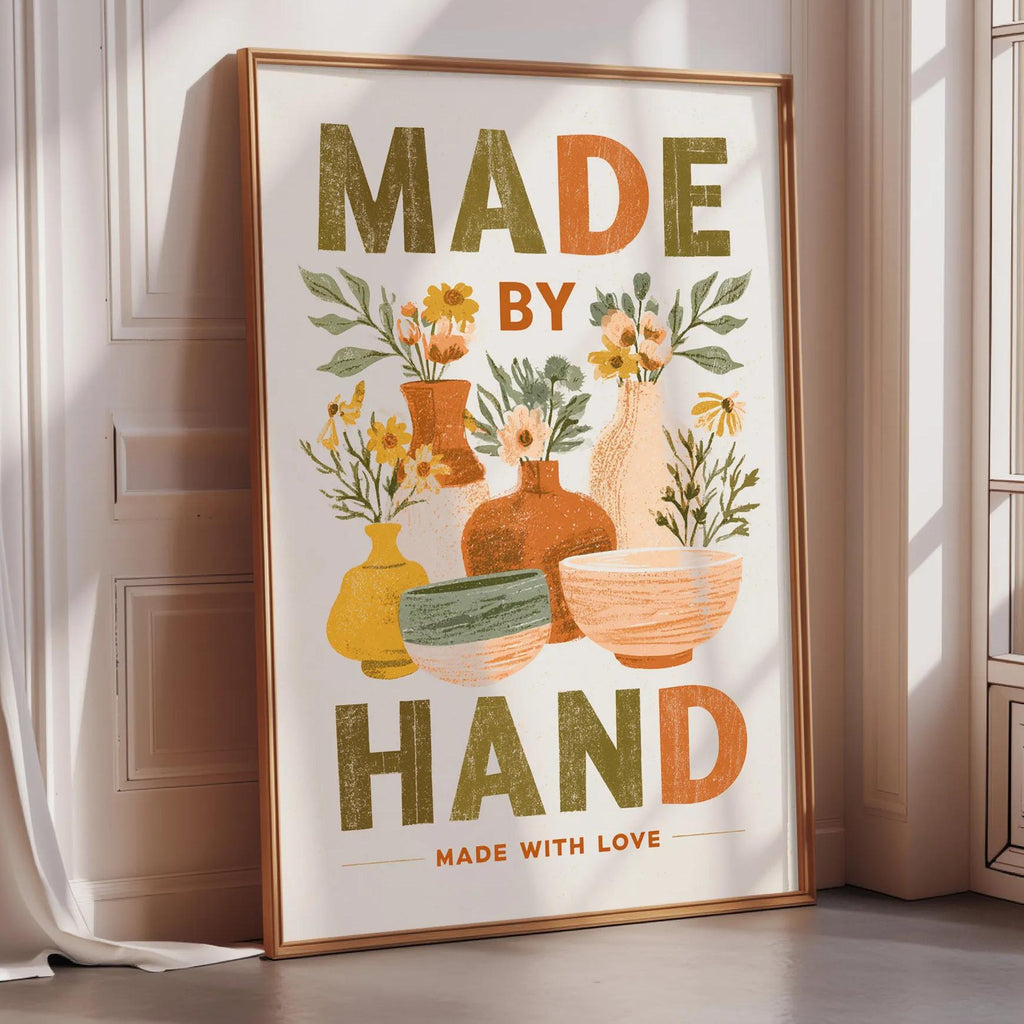 The image is a framed poster with a floral design and the text "MADE BY HAND MADE WITH LOVE".