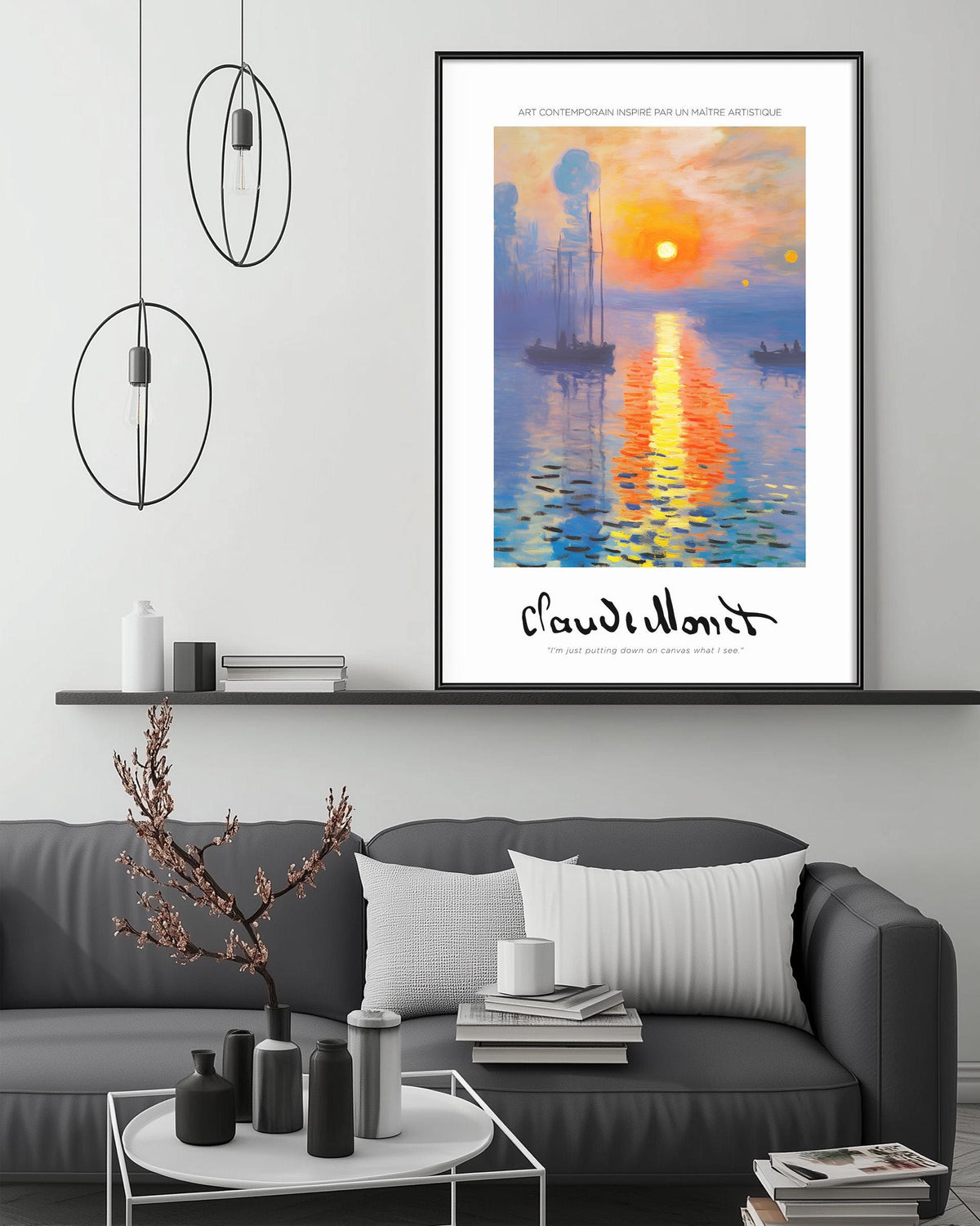 a modern living room with a gray sofa, a coffee table, and a framed painting of a sunset over a body of water.