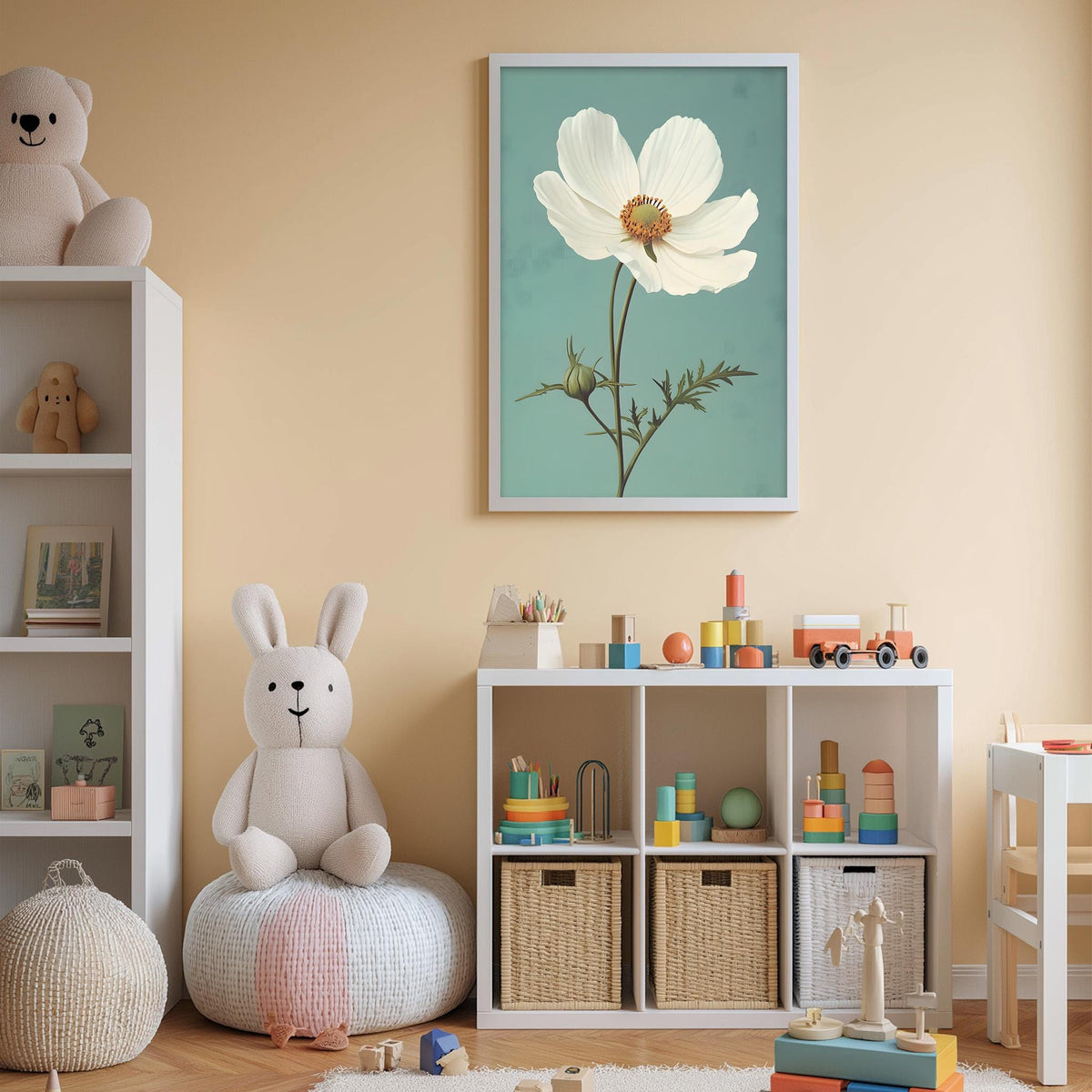 A cozy children's room with a white rabbit sitting on a bean bag chair, surrounded by toys and storage bins. A framed picture of a white flower is displayed on the wall above a white bookshelf.
