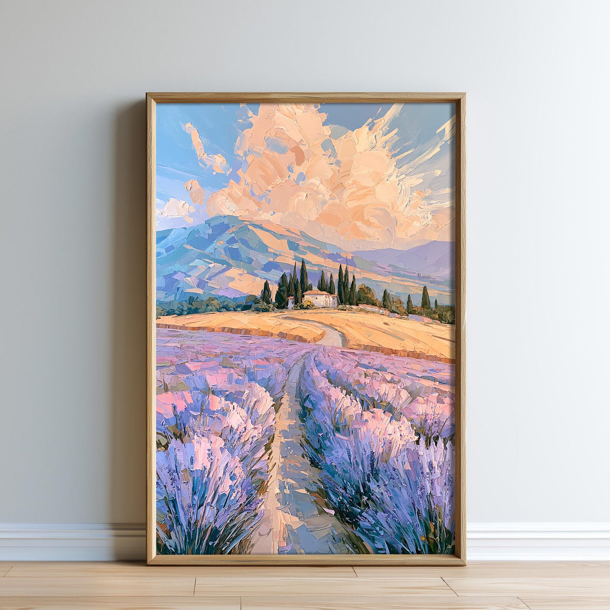The image is a framed painting depicting a picturesque landscape with a winding path leading through a field of lavender flowers, surrounded by mountains and a cloudy sky.