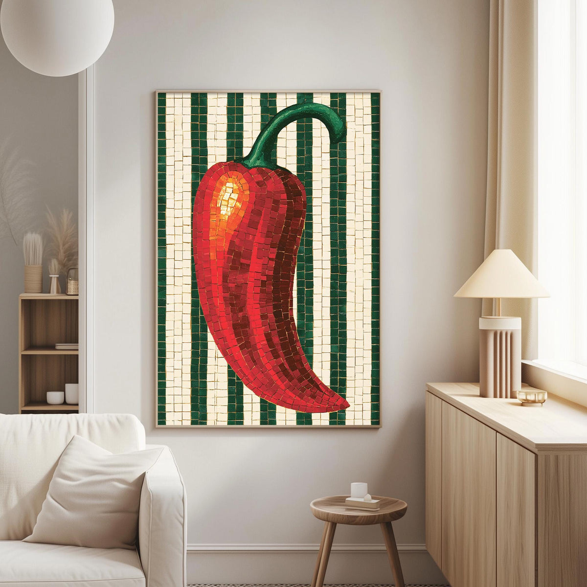 a living room with a large, colorful mosaic artwork of a red pepper hanging on the wall. The artwork is composed of small tiles in shades of green and white, creating a vibrant and eye-catching design. The room also includes a white sofa, a wooden side table, and a lamp, contributing to a cozy and inviting atmosphere.