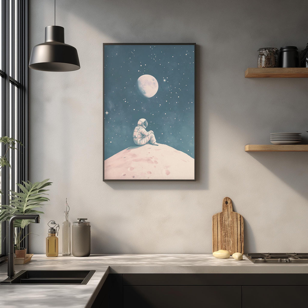 a framed illustration of a person sitting on a rock, gazing up at the night sky with a full moon and stars.