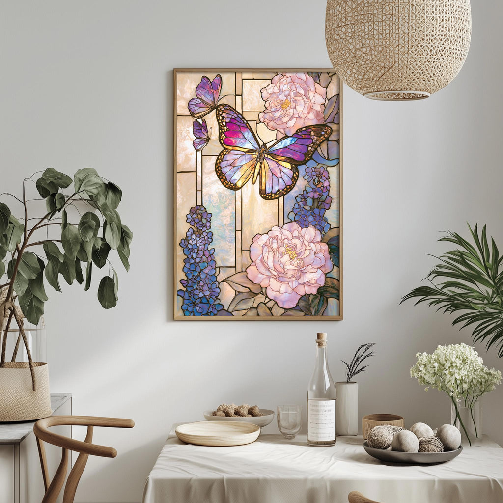 a dining table with a white tablecloth, surrounded by chairs. On the table, there are various items such as a vase with flowers, a bottle, and a bowl. Above the table, there is a framed picture of a butterfly and flowers hanging on the wall.