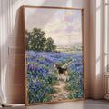 A framed painting depicting a dog standing in a field of purple flowers, with a scenic landscape in the background.