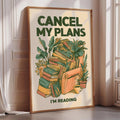 a poster with a colorful illustration of a stack of books and plants, along with the text "CANCEL MY PLANES I'M READING".