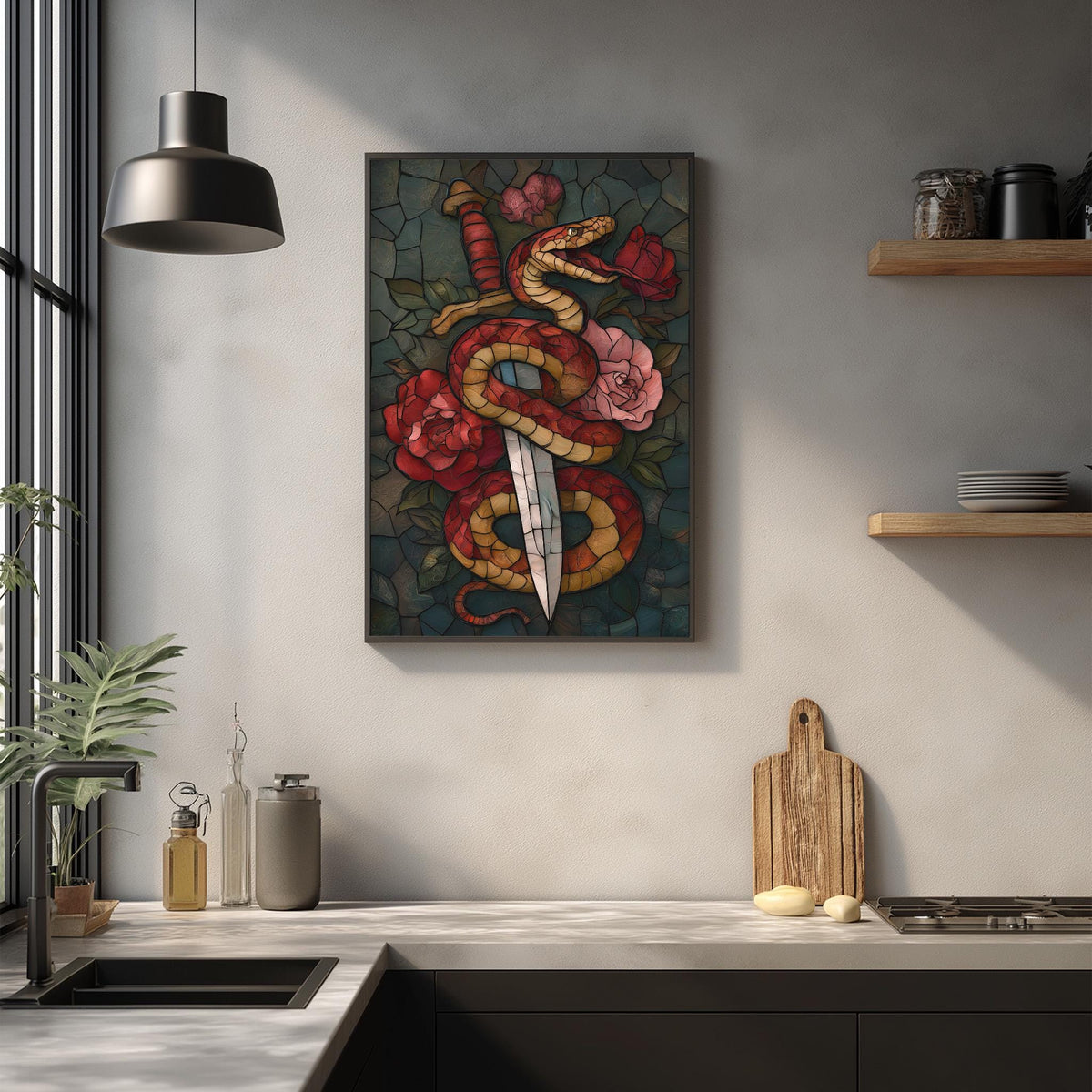 a kitchen counter with a framed artwork of a snake and flowers hanging on the wall above it. The counter also has various kitchen items such as a cutting board, a knife, and a bottle.