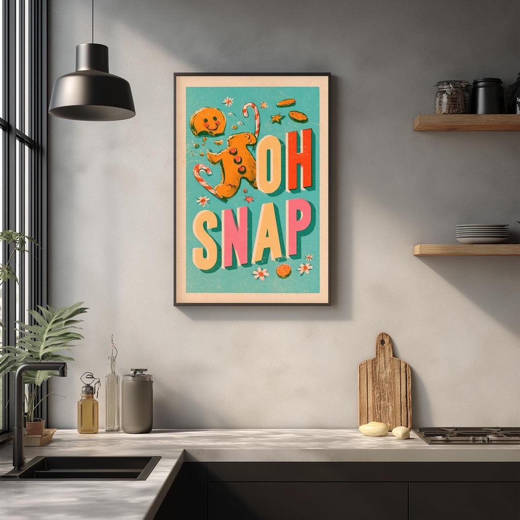 a kitchen counter with various kitchen items, such as a cutting board, a sink, and a potted plant. Above the counter, there is a framed poster with the text "OH SNAK" in a colorful, playful font.