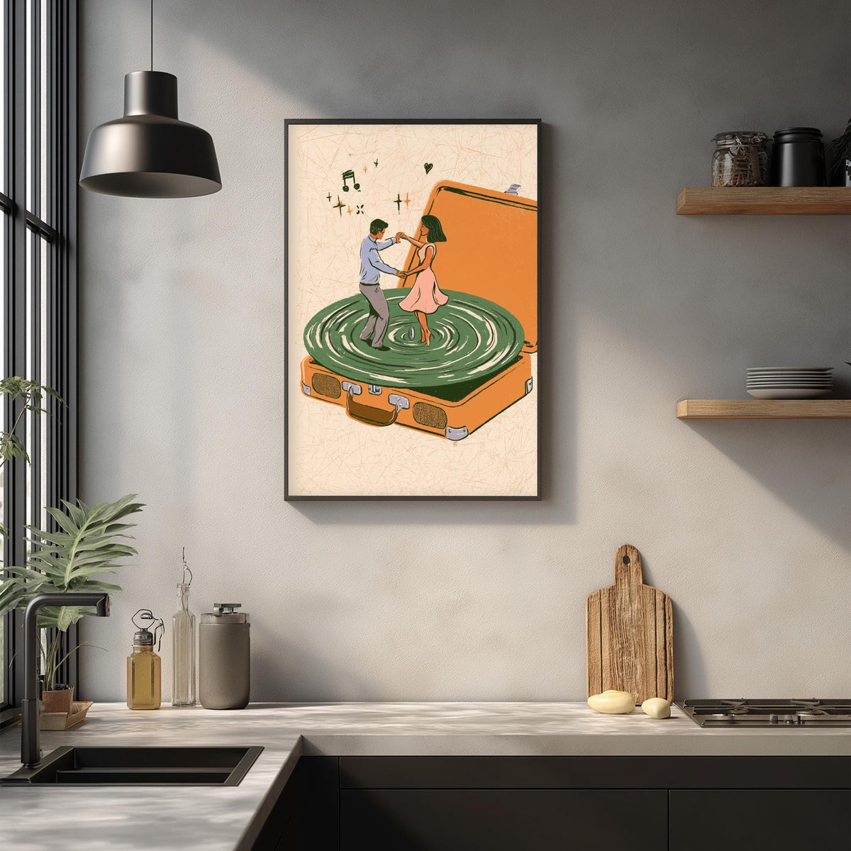 a framed illustration of a man and a woman dancing on a turntable, with a suitcase and a wooden cutting board nearby.