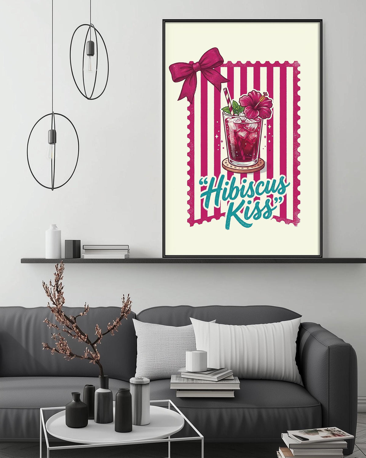 a framed illustration of a glass with a pink drink and a red bow, accompanied by the text "Hibiscus Kiss" on a white background.