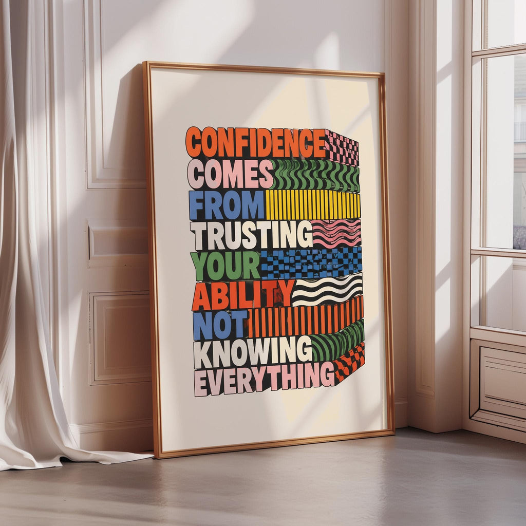 a poster with a motivational message about confidence and trust, displayed on a wall in a room with a window.