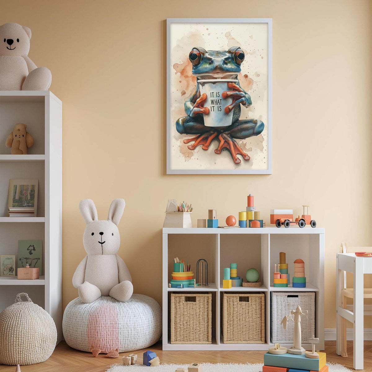 A child's bedroom with a white bookshelf, a stuffed rabbit, and a framed painting of a frog holding a cup.