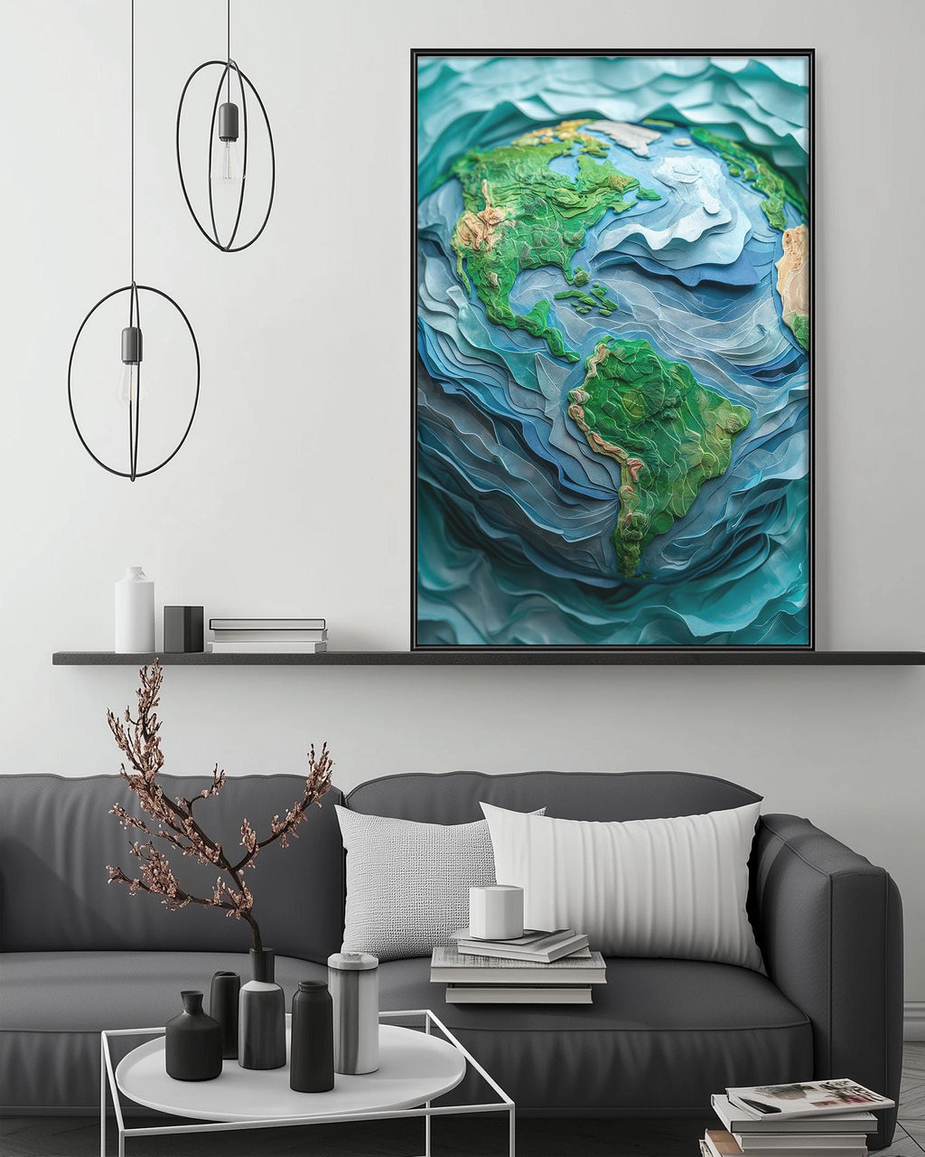 a large, colorful painting of the Earth displayed on a wall above a gray couch in a living room setting.