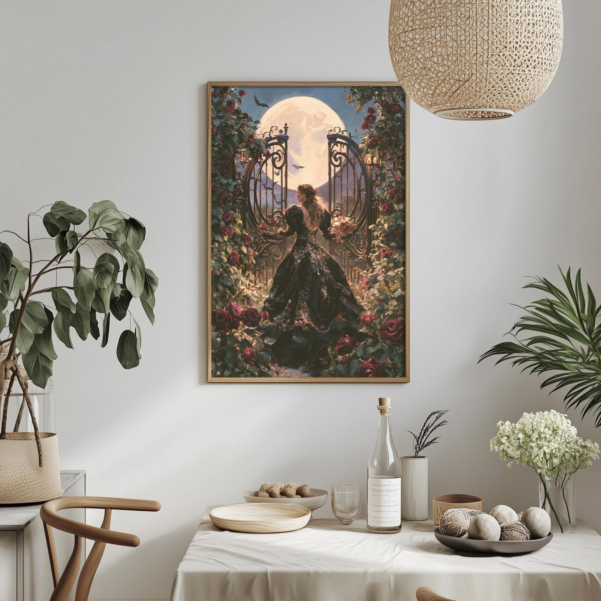 a framed painting of a woman in a black dress standing in a garden, with a full moon and a gate in the background. The painting is hung on a wall above a table with various items on it, including a bottle, a bowl, and a vase.