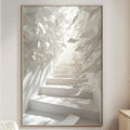 a serene and modern living room with a large white abstract painting hanging on the wall, depicting a staircase leading to a bright, sunlit space.