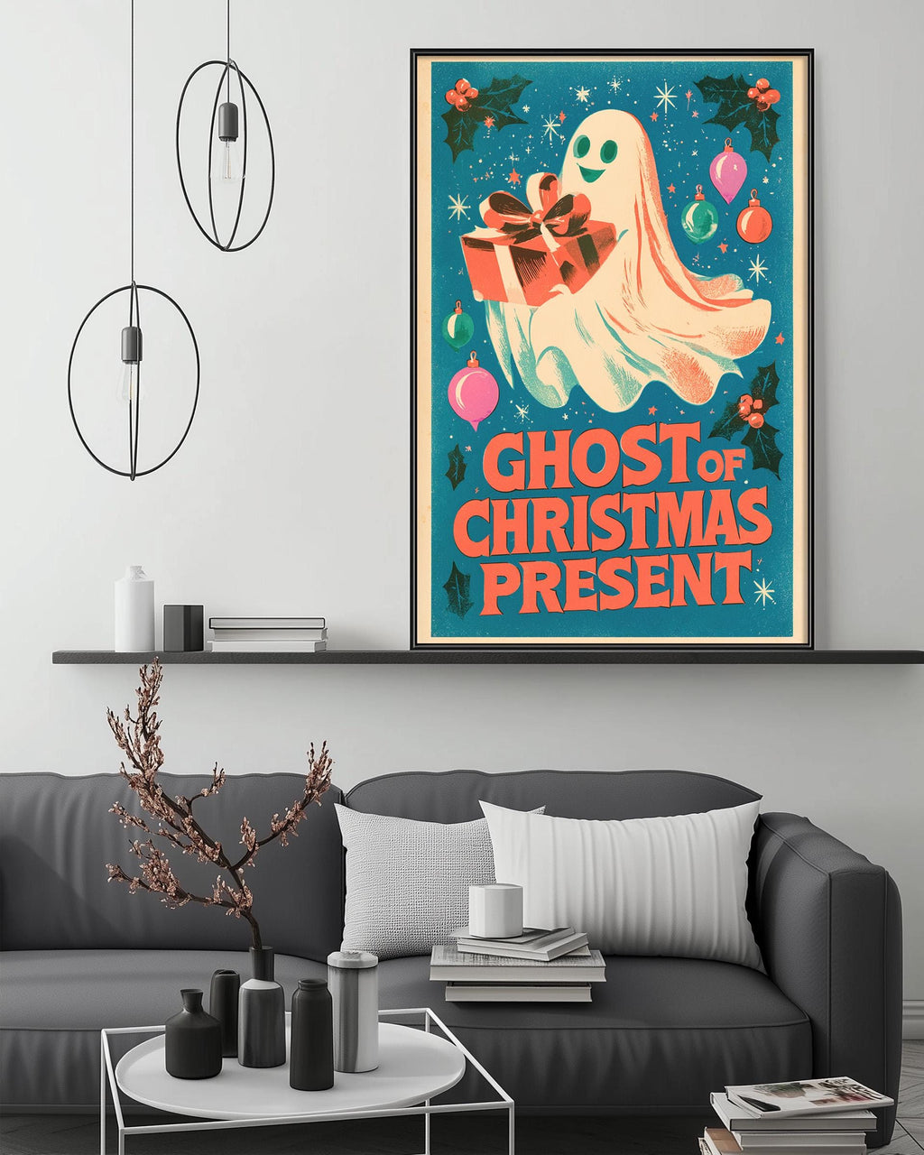 a poster of a ghost holding a gift, hanging on a wall above a gray couch with a coffee table in front of it.