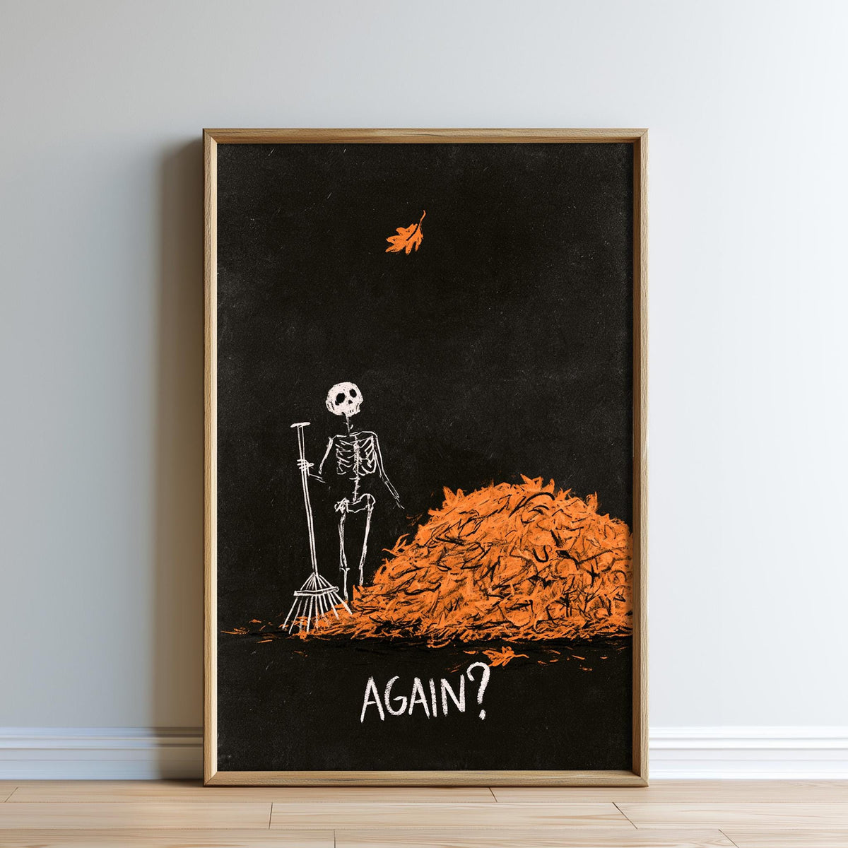 The image is a framed poster with a skeleton standing next to a pile of orange leaves. The poster has a black background and features a single leaf floating in the air above the skeleton. The word "AGAIN?" is written below the poster.