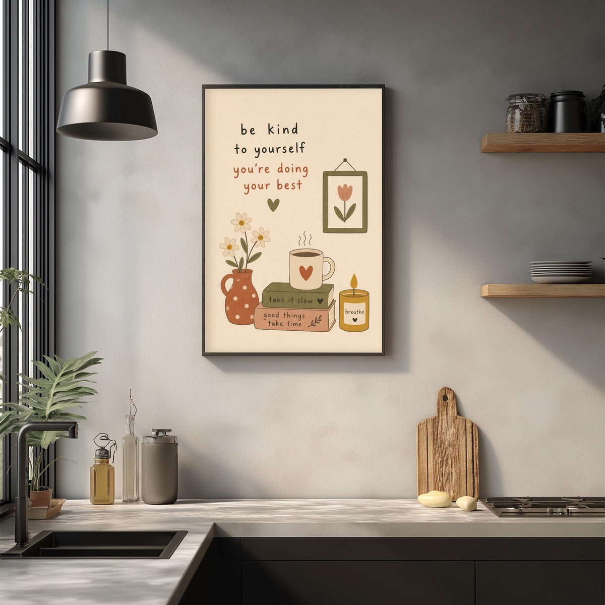 a kitchen counter with various items such as a coffee mug, a vase with flowers, a wooden cutting board, and a potted plant. Above the counter, there is a framed poster with a message encouraging the viewer to be kind to themselves and take care of their best.