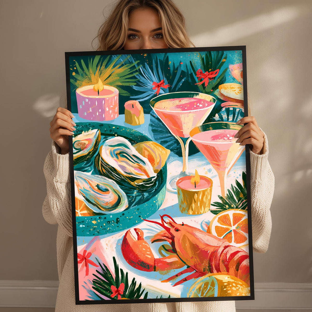 A woman holds up a framed illustration of a vibrant seafood dish, featuring a lobster, shrimp, and various colorful ingredients.
