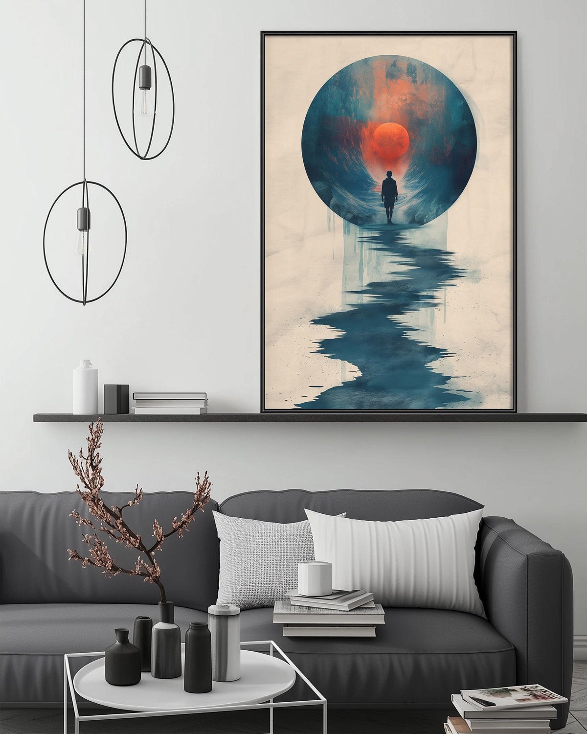 a modern living room with a gray sofa, a coffee table, and a large abstract painting hanging on the wall above the sofa.