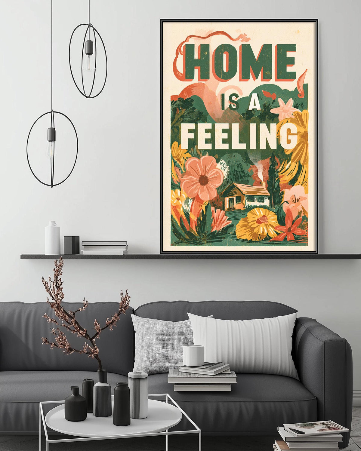 a living room with a gray couch, a coffee table, and a framed poster with a floral design hanging on the wall above the couch.