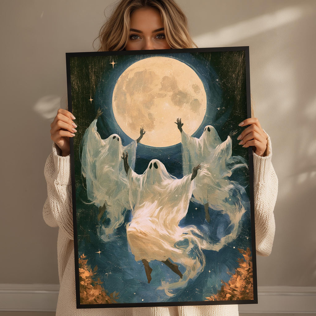 A woman holds up a framed painting depicting a group of ghostly figures floating in the night sky, with a large full moon in the background.