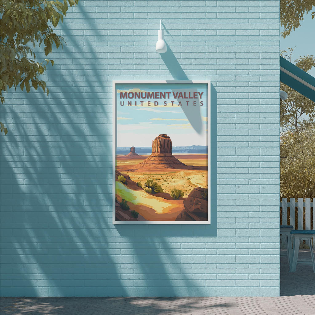 a framed poster of Monument Valley, a famous landmark in the United States, displayed on a blue wall.