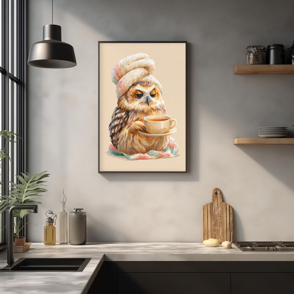 A framed painting of an owl wearing a hat and holding a cup of tea is hanging on a wall in a kitchen.