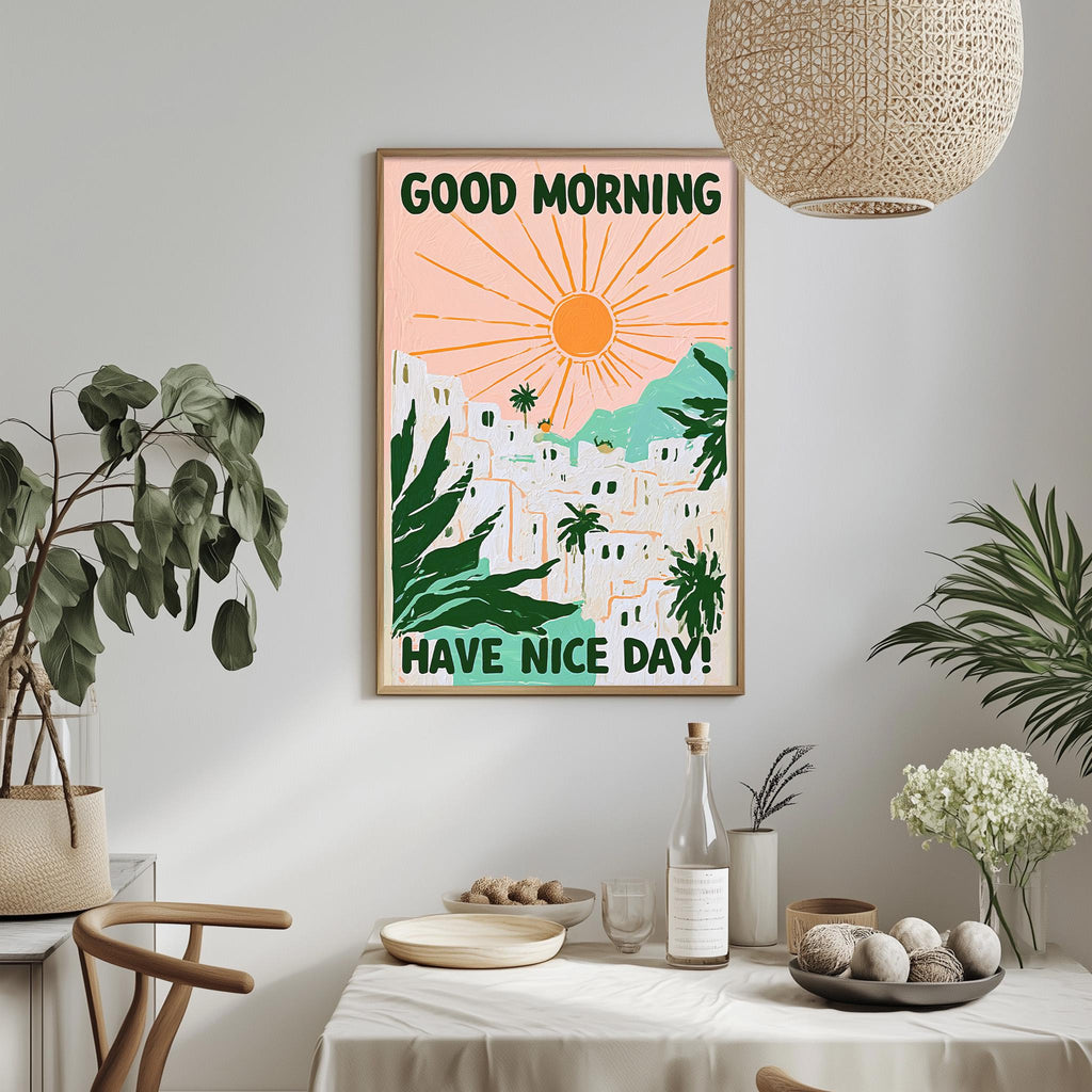 a framed poster with a tropical landscape and the text "GOOD MORNING HAVE NICE DAY!" hanging on a wall above a dining table with various decorative items and plants.