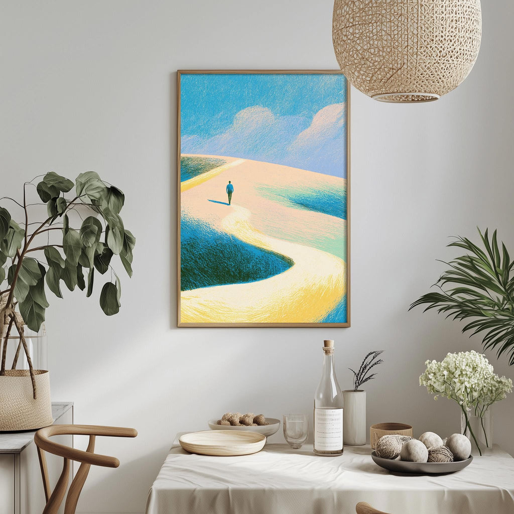 a dining table with a white tablecloth, a bottle, a bowl, and a vase with flowers. Above the table, there is a framed painting depicting a person walking on a path through a desert landscape with a blue sky and clouds.