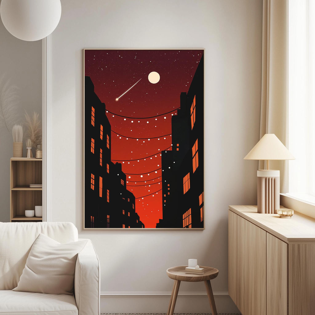 a cozy living room with a white sofa, a wooden side table, and a framed artwork of a cityscape at night with a full moon and string lights.