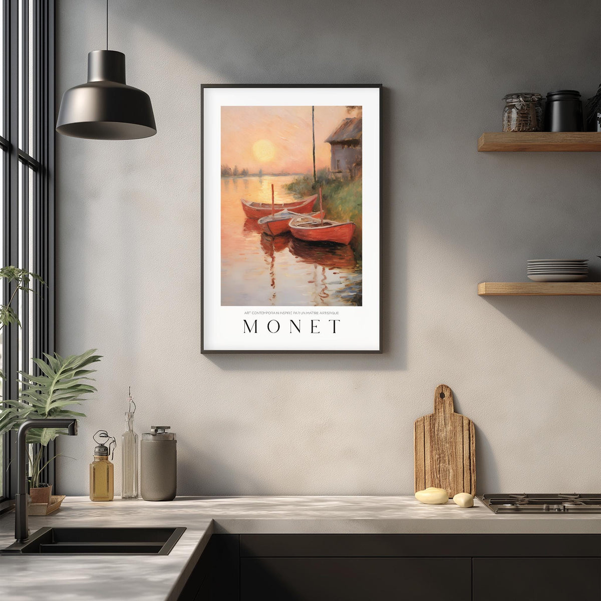 a framed painting of a sunset over a body of water, with two boats floating on the water. The painting is hanging on a wall above a kitchen counter, which has various kitchen items such as a cutting board, a bottle, and a vase.