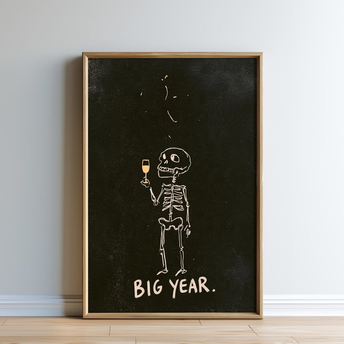 a skeleton holding a wine glass and the text "BIG YEAR."