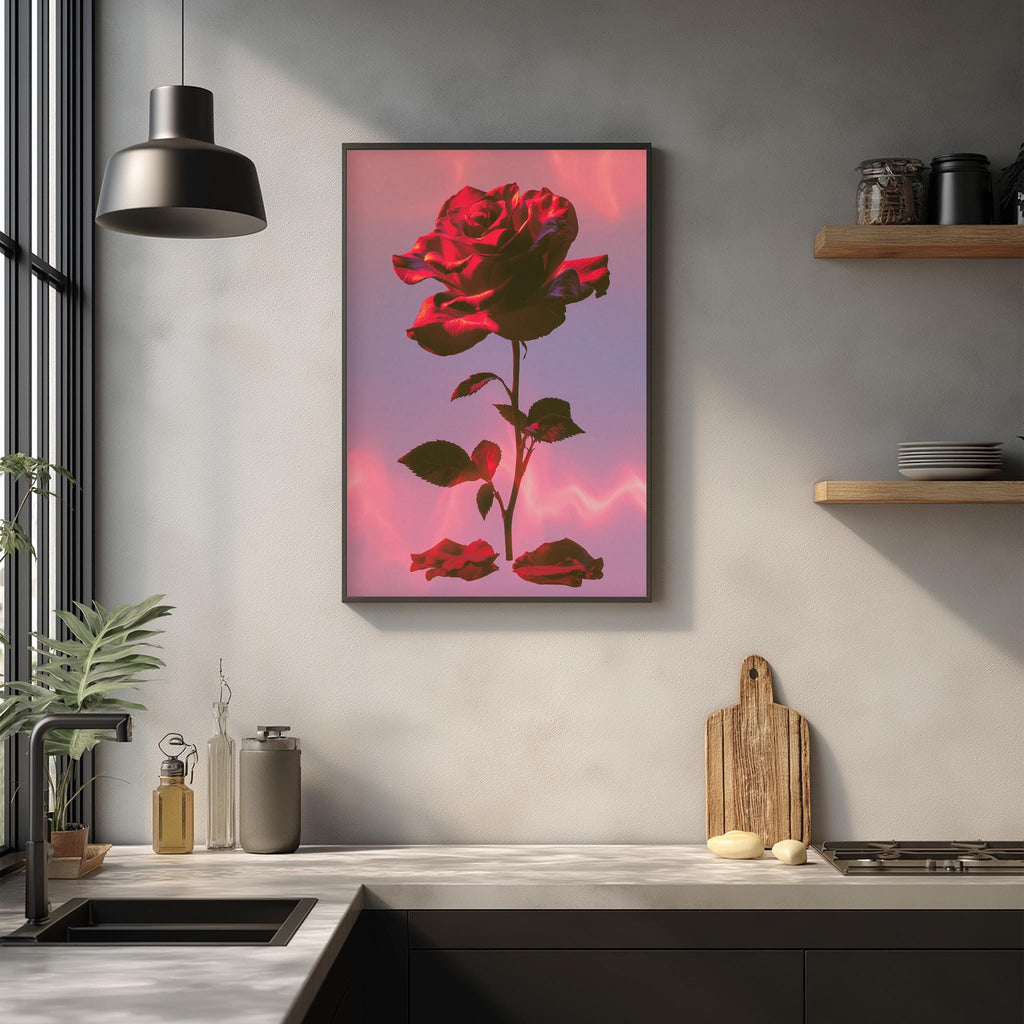 a kitchen counter with a framed picture of a red rose hanging above it. The counter has various kitchen items, such as a cutting board, a soap dish, and a bottle. The overall scene has a modern and stylish aesthetic.