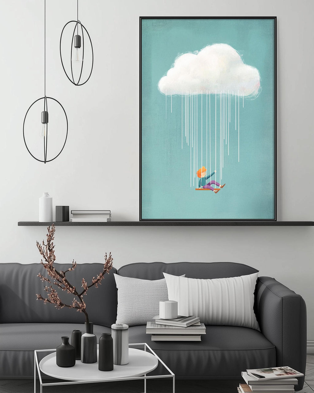 a cozy living room with a gray sofa, a coffee table, and a large framed artwork depicting a person sitting on a swing under a cloud.