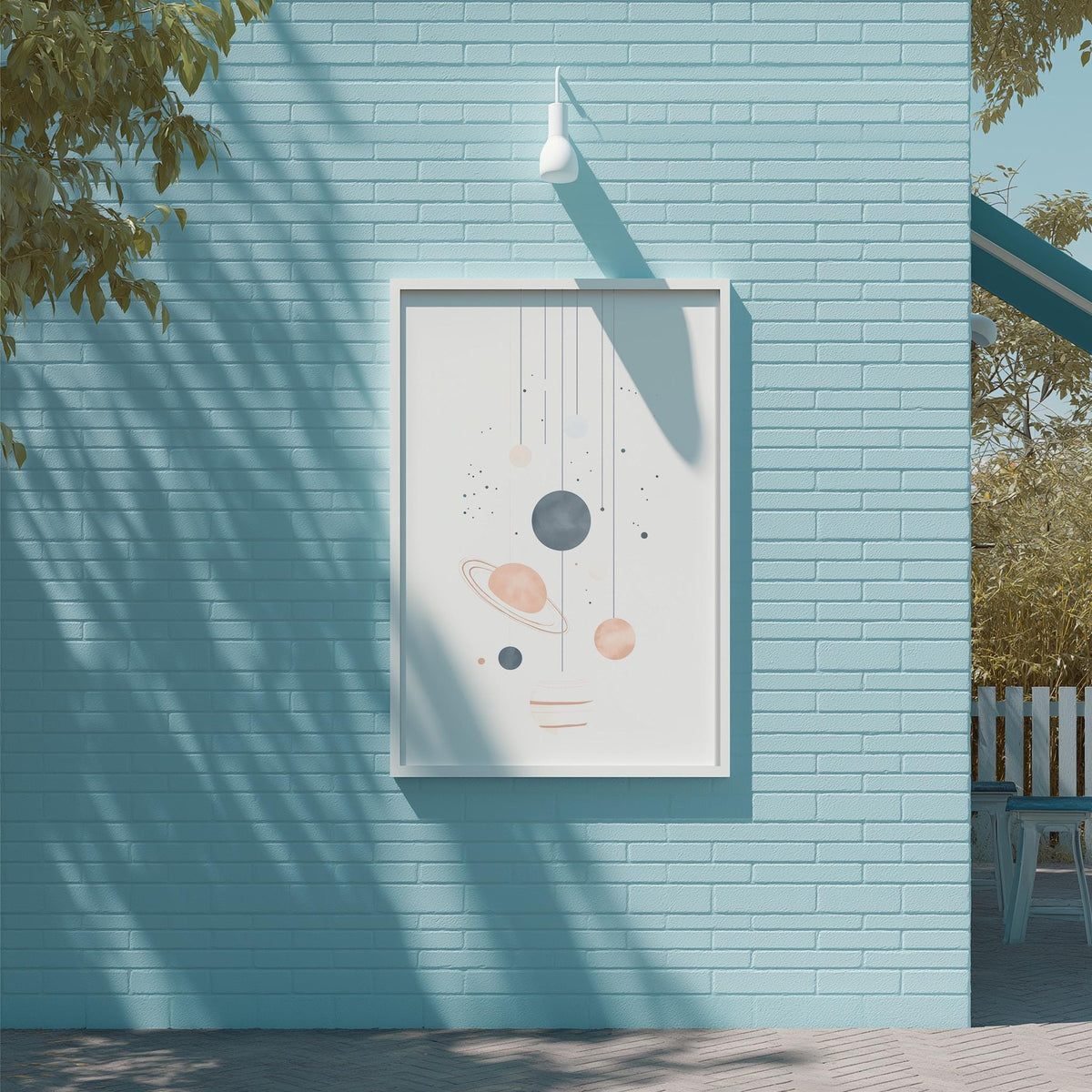 a blue brick wall with a framed artwork depicting a space scene, including planets and stars.