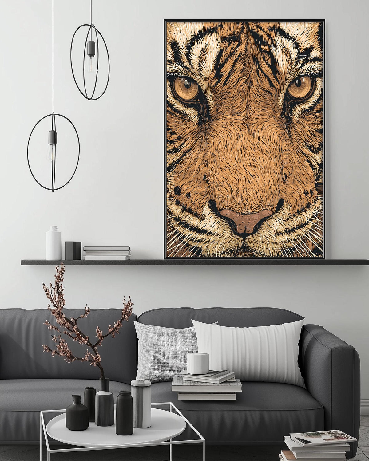 a large tiger face painting on the wall above a gray couch with a coffee table in front of it. The room has a minimalist and modern design, with a shelf displaying decorative items and a pendant light hanging above the couch.