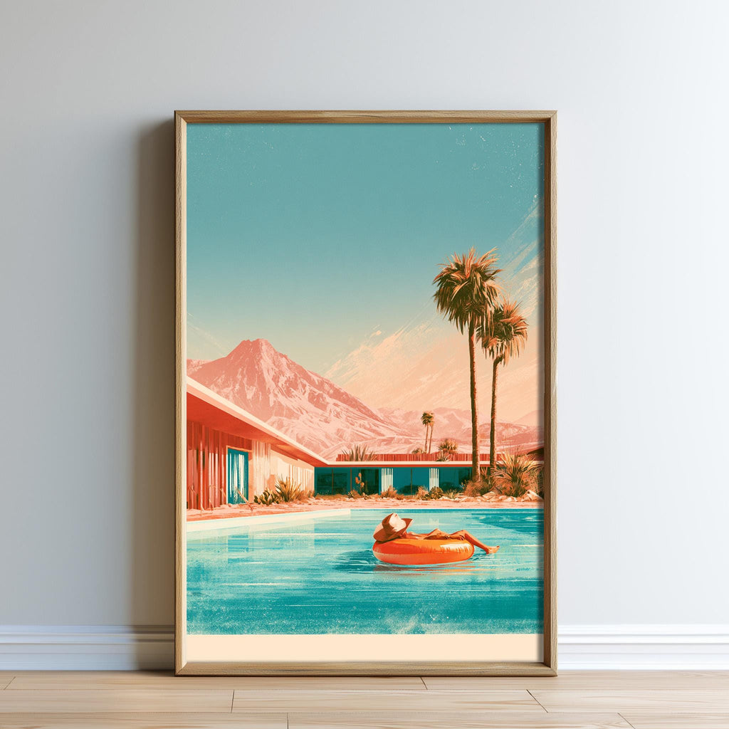A framed illustration depicting a person relaxing on an orange inner tube in a swimming pool, with palm trees and mountains in the background.