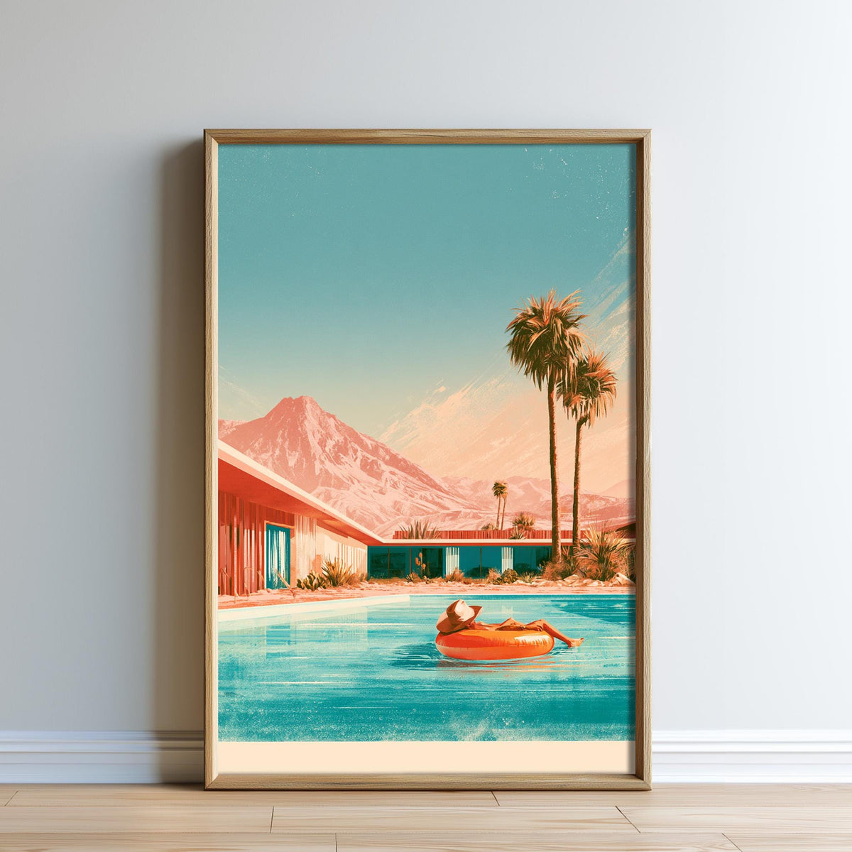 A framed illustration depicting a person relaxing on an orange inner tube in a swimming pool, with palm trees and mountains in the background.