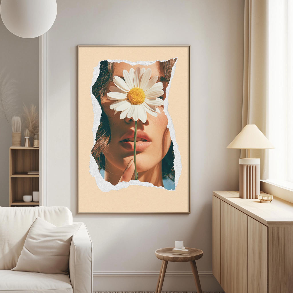 a large framed picture of a woman's face with a white flower covering her eyes, hanging on a wall in a living room.
