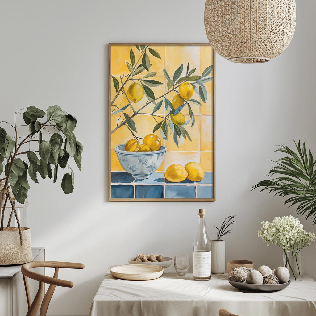 a dining table with a bowl of lemons, a bottle, and a vase of flowers, along with a potted plant and a hanging light fixture.