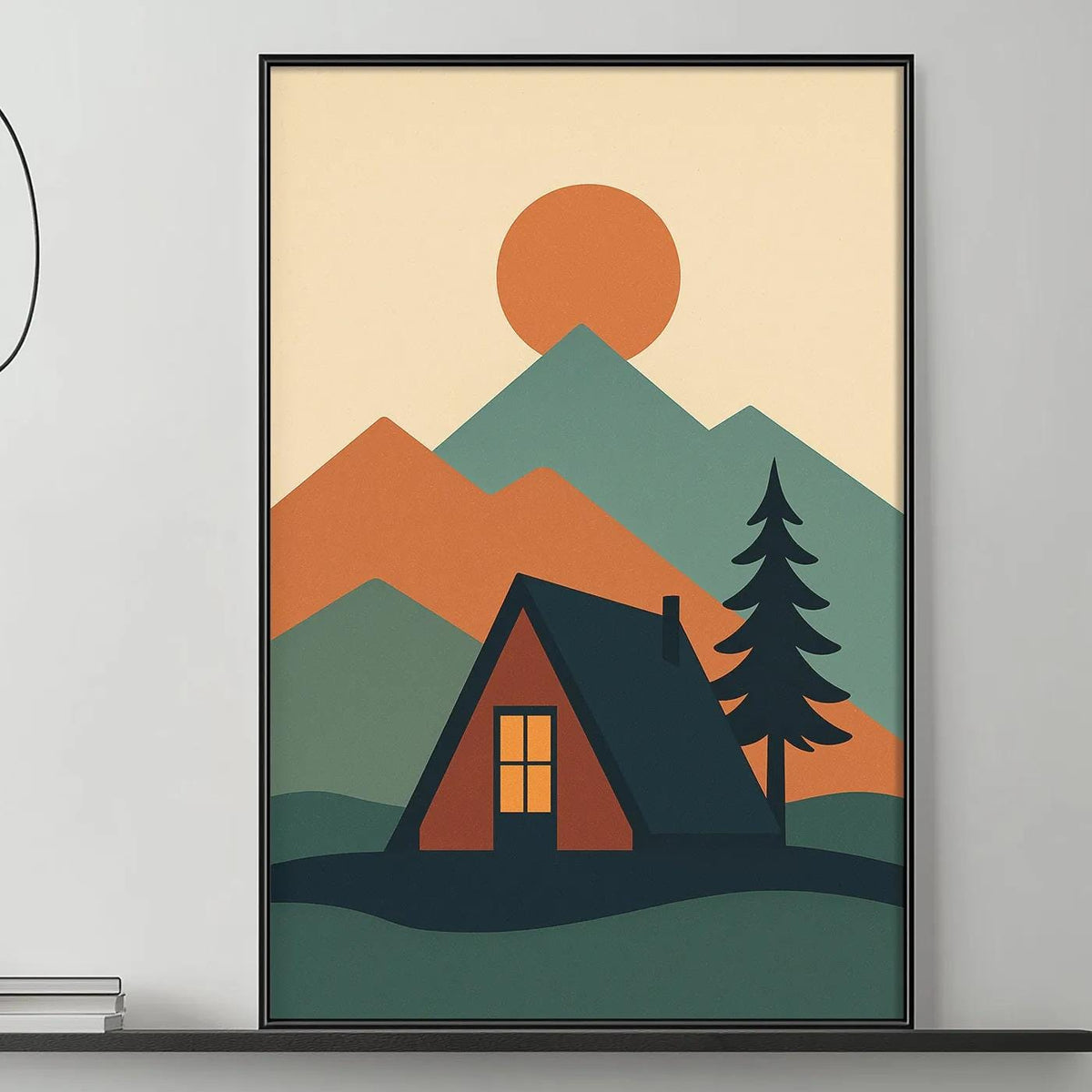 a cozy living room with a gray sofa, a coffee table, and a large framed print of a mountain landscape with a cabin in the background.