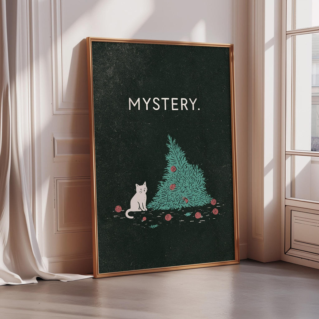 a framed poster with a cat sitting on a Christmas tree, surrounded by ornaments.