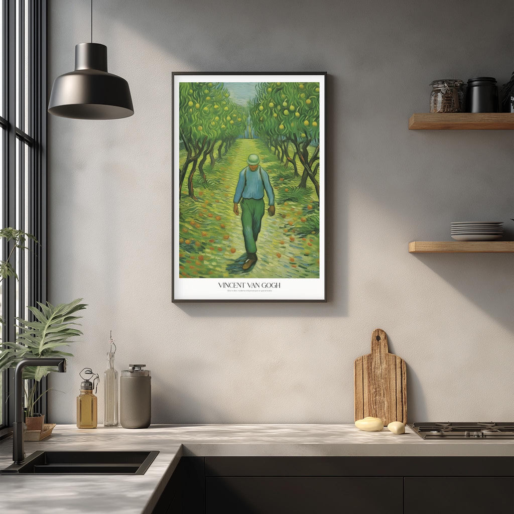a framed painting of a man walking through a path lined with trees, hanging on a wall above a kitchen counter.