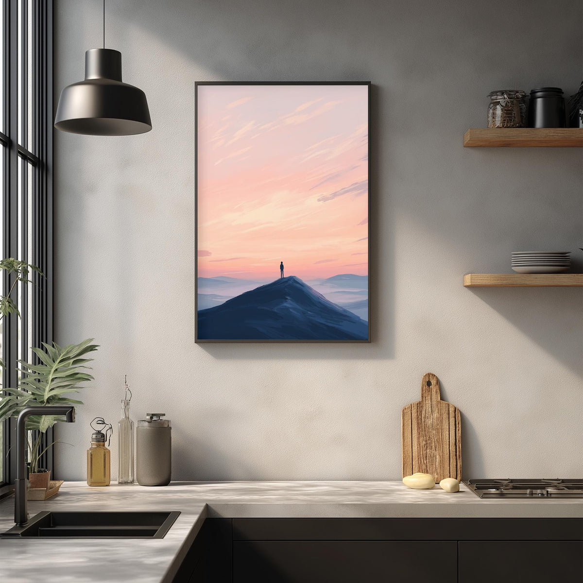 a kitchen counter with a framed picture of a mountain landscape hanging above it. The kitchen has a modern design with a wooden shelf and a potted plant on the counter.