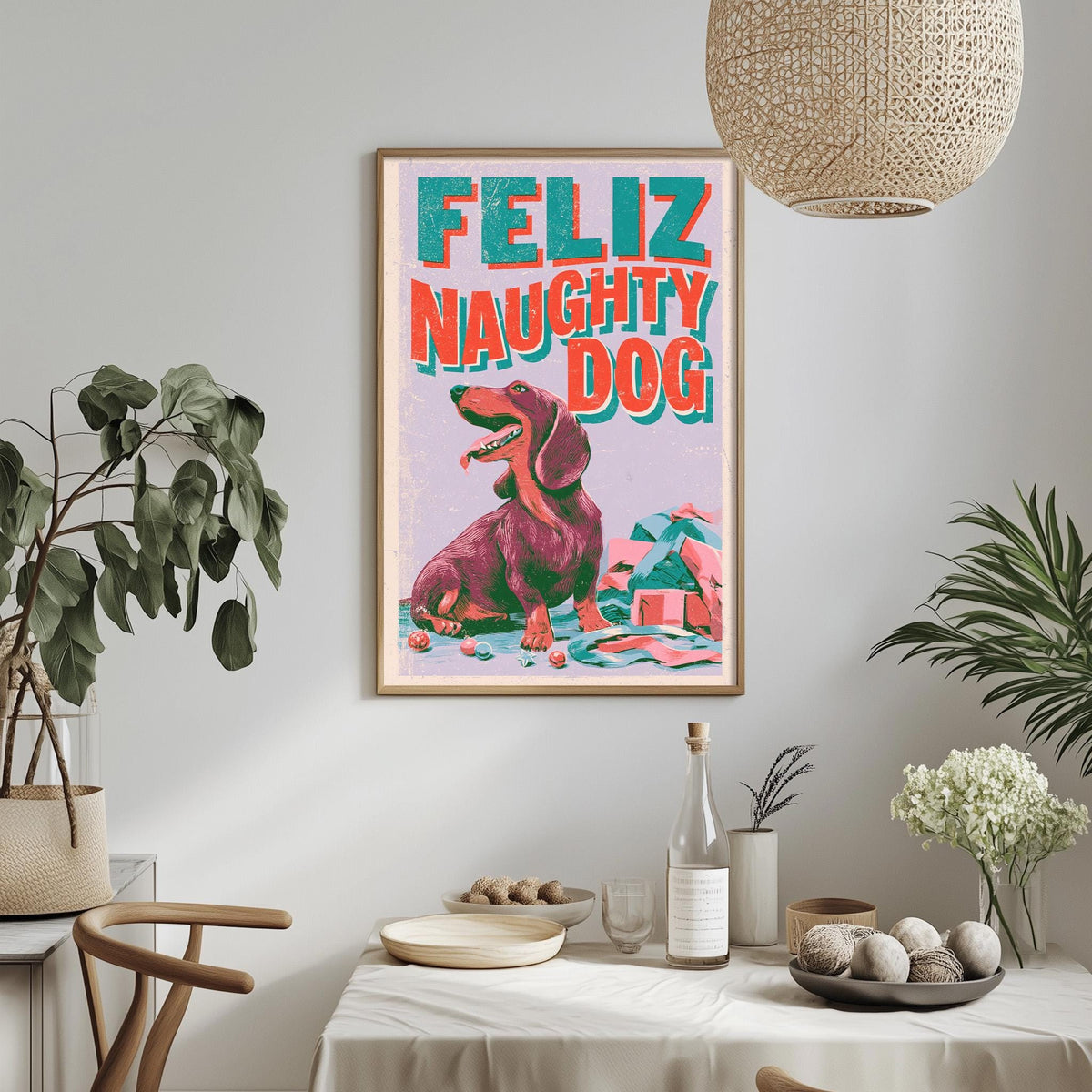 a framed poster of a dog with the text "Feliz Naughtily Dog" on it, hanging on a wall above a dining table with various items on it.