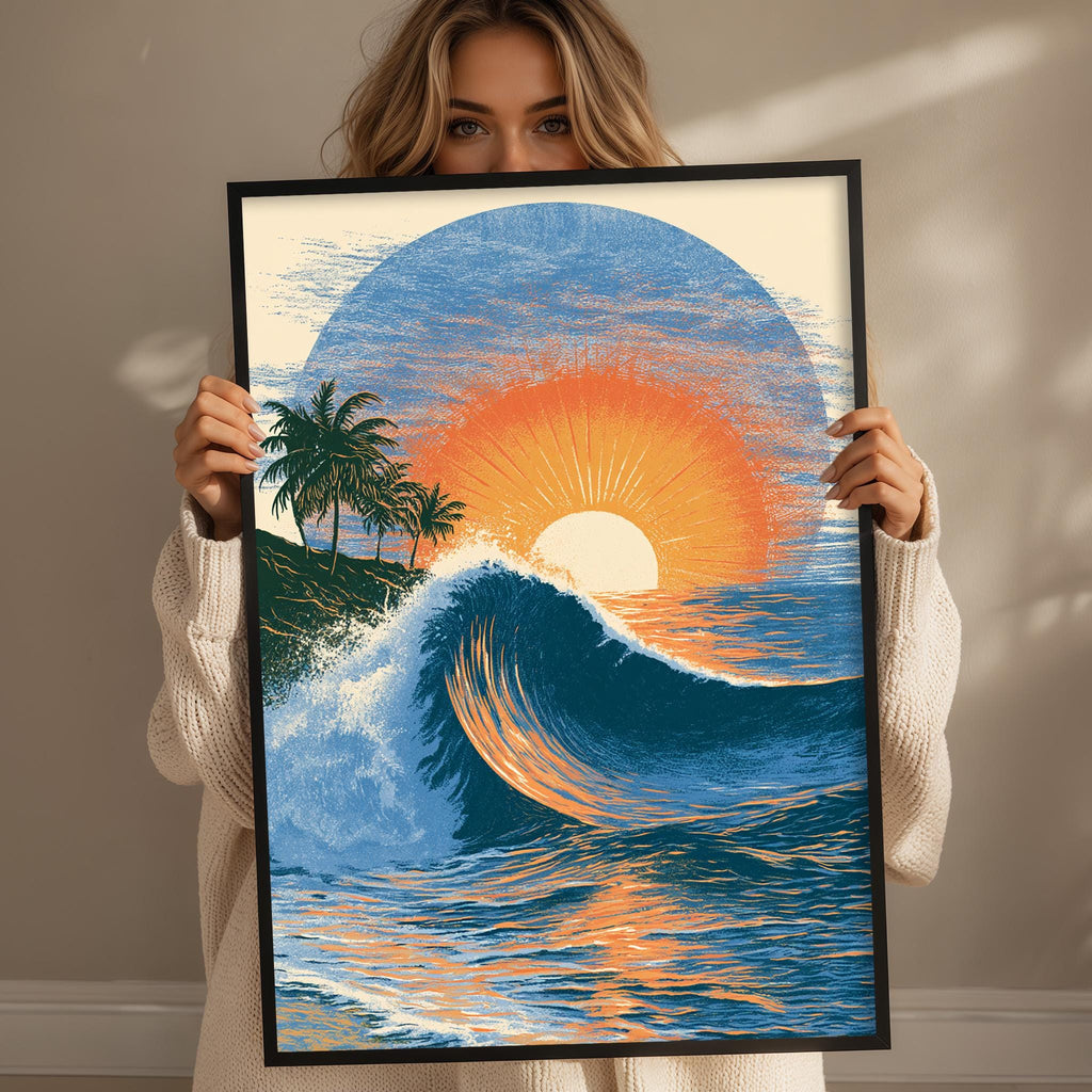 A woman holds up a framed painting depicting a vibrant sunset over a crashing wave.
