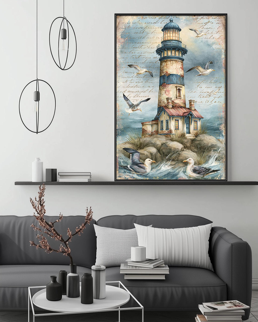 a cozy living room with a gray sofa, a coffee table, and a large framed painting of a lighthouse on the wall above it.