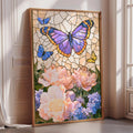 A framed stained glass artwork depicting a butterfly surrounded by colorful flowers, including pink peonies and blue and yellow butterflies, set against a white background.